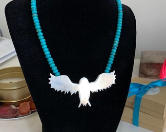 Handmade sterling silver owl necklace with turquoise beads