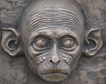 Macaque baby monkey. Cold cast bronze