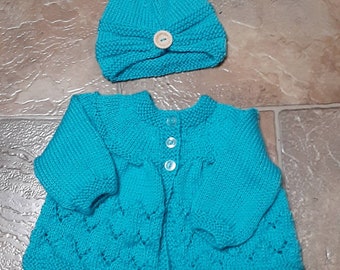 Baby matinee jacket and turban style hat. Lovingly hand knitted. Popular and always in demand.  Suitable for babies 0-3 months.