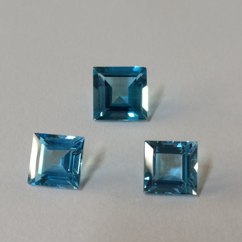 Swiss blue topaz princess cut,3 pcs set,tcw-11.2ct image 1