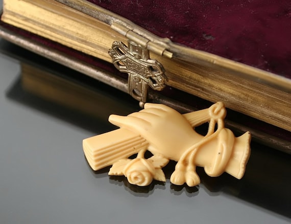 Celluloid brooch best sale