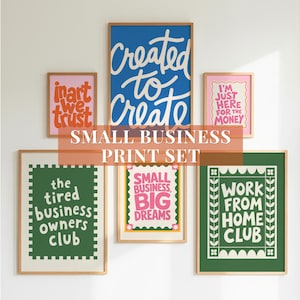 May include: A set of six framed wall art prints featuring various typography designs. The prints include phrases like Created to Create, In Art We Trust, I'm Just Here For The Money, The Tired Business Owners Club, Small Business Big Dreams, and Work From Home Club.