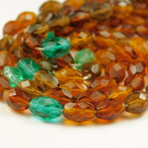 30 cuentas de vidrio checo ovaladas facetadas de 9 x 7 mm - Mezcla de topacio y esmeralda - Cuentas ovaladas - Vidrio checo - Artículos de joyería - Artículos para manualidades