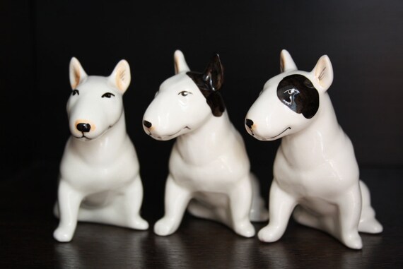 white porcelain dog figurines