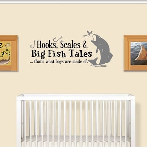 May include: A nursery wall decal with a gray fish jumping out of the water. The decal includes the text "Hooks, Scales & Big Fish Tales... that's what boys are made of."