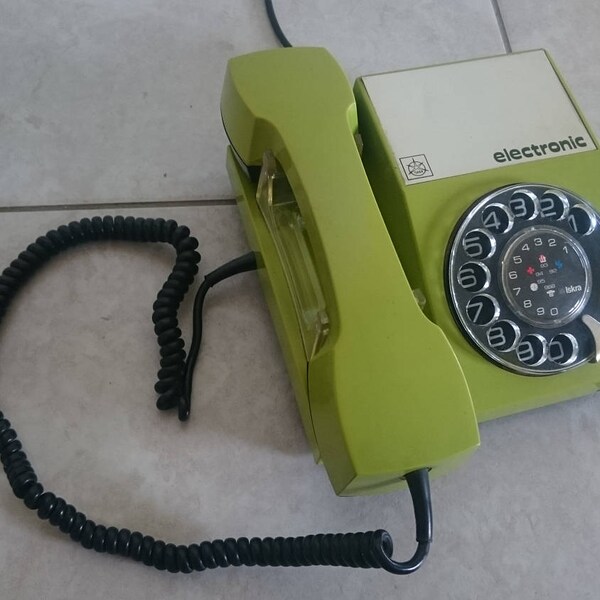 Vintage rotary phone, Yugoslavian communist phone, green old phone