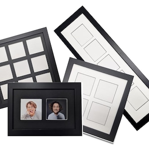 May include: A collection of black picture frames with white matting. The frames vary in size and configuration, including multi-photo designs with square and rectangular openings. One frame displays two photos of people.