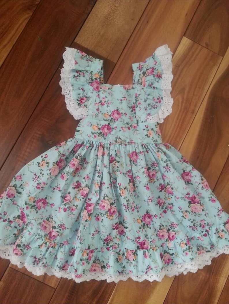 Perfect for Easter Sizes 6 month to 6x. Beautiful handmade boutique style dress
