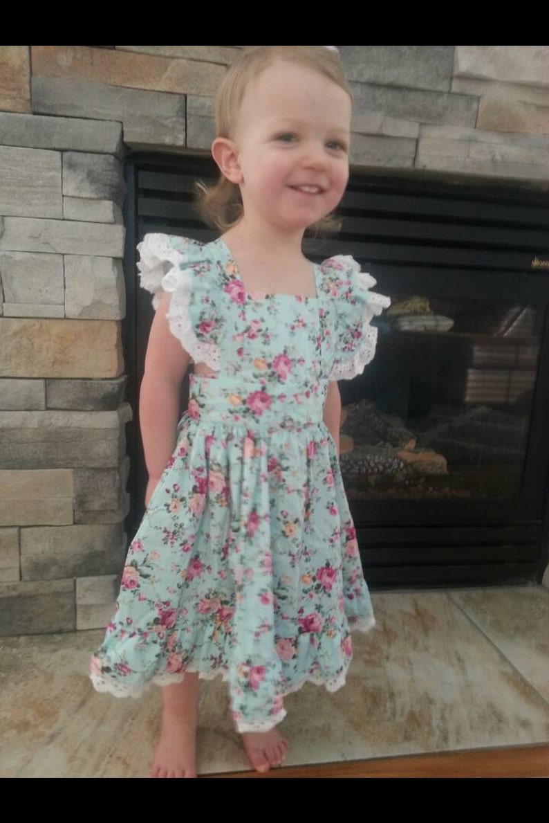 Perfect for Easter Sizes 6 month to 6x. Beautiful handmade boutique style dress