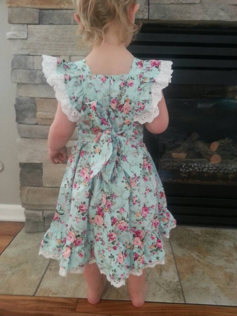Perfect for Easter Sizes 6 month to 6x. Beautiful handmade boutique style dress