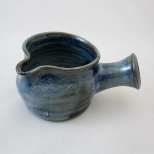 Gravy boat for serving all kinds of sauces: gravy, hot fudge, butterscotch