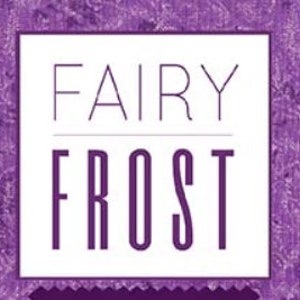 May include: A purple background with a textured pattern and a white square containing the words "FAIRY FROST" in a stylized font. The text is in a dark purple color.