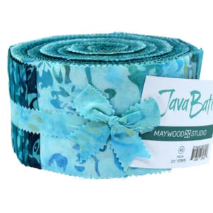 May include: A roll of Java Batik fabric strips by Maywood Studio, featuring 40 pieces of 2.5 inch wide strips in various shades of blue and teal with floral patterns, secured with a matching fabric ribbon and a white paper label.