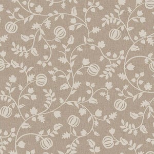 May include: A wallpaper featuring a repeating pattern of light beige vines, leaves, and small pumpkins set against a textured, medium brown background. The design consists of continuous, flowing stems that connect the botanical elements throughout.
