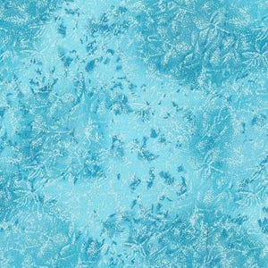 May include: A fabric with a blue and white pattern. The design features a mottled effect with a light blue background and white, snowflake-like shapes scattered across the surface. The overall appearance is reminiscent of frost or ice.
