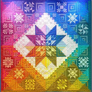 May include: A square quilt featuring a vibrant rainbow gradient background transitioning from red and orange to yellow, green, blue, and purple. The center displays a large white star motif with intricate feather and geometric quilting patterns.