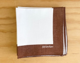 Ocho servilletas de tela marrones y blancas - Bob Van Allen