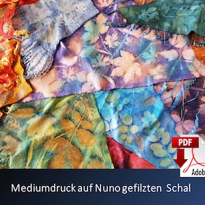 May include: A close-up of a colorful fabric with a leaf pattern. The fabric is made of wool and has a soft, textured feel. The fabric is arranged in a patchwork pattern, with different colors and patterns. The fabric is called "Mediumdruck auf Nunogefilzten Schal".