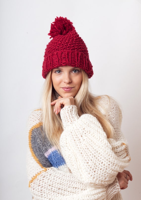 red toque with pom pom