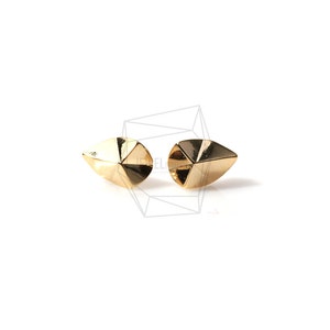 May include: A pair of gold-toned geometric earrings with a triangular shape.