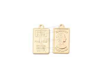 May include: Gold-colored pendant charm shaped like a gold bar with the words "CREDIT SUISSE" and "FINE GOLD" on one side and a profile of Queen Elizabeth II on the other side.