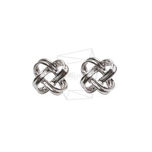 May include: A pair of silver-colored stud earrings. Each earring features an interwoven knot design, creating a symmetrical, geometric shape. The earrings are set against a plain white background, highlighting their metallic sheen and intricate details. These earrings are suitable for everyday wear.