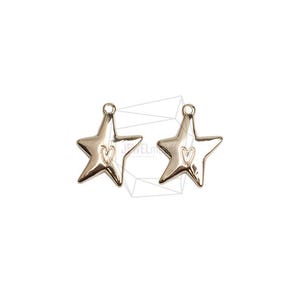 May include: Two silver-colored star-shaped charms with a small heart design in the center. Each charm has a loop at the top for attaching to a necklace or bracelet. The charms are on a white background.