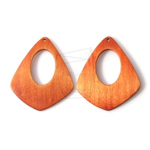 May include: Two wooden triangle-shaped earrings with a rounded oval cutout in the center. The earrings are a light orange color.
