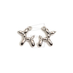 May include: Two silver balloon dog charms, each with a jump ring for attaching to jewelry or other crafts.