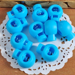 10-100Pcs Plastic Single Hole Round Cordlock, Toggles Stopper,18mm drawstring lock,Light Blue cord lock,elastic cord stop,Toggle Lock supply
