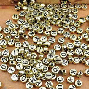 200 cuentas de números, cuentas de números acrílicos redondos de color dorado de 7 mm, pequeñas cuentas redondas de números negros, cuentas espaciadoras, artesanías para niños, cuentas de joyería