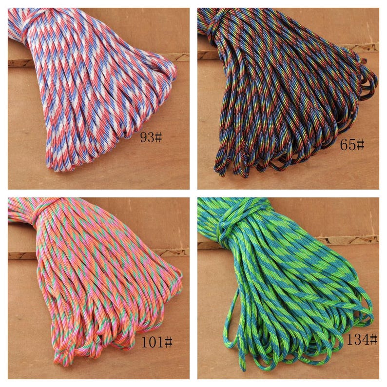 May include: Four bundles of colorful paracord in various patterns. One bundle is red, white, and blue; another is a mix of blue, green, and brown; a third is pink and orange; and the last is green and blue. Each bundle has a number label.