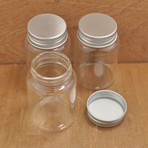 Glass Bottles 10pcs clear glass bottles with Silver Aluminum Screw Caps,Small Glass Jar Vial Charm Pendants,Empty Glass Vials--70x46mm.