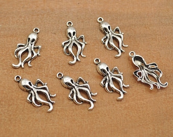 May include: Eight silver octopus charms with a detailed design. The charms are perfect for jewelry making, scrapbooking, and other craft projects.