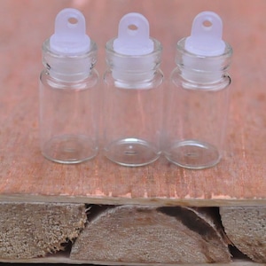 Glass Bottles 50pcs Miniature Small Glass Bottles with plastic cap,Glass Jar Vial Charm Pendants,Empty Glass Vials,Tiny Bottle--21x10mm.