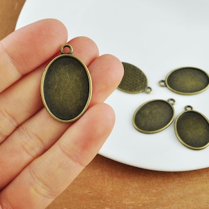 10-50Pcs Antique Bronze Alloy Oval Pendant Tray, Pendant Tray Blanks，Bezel Cabochon Settings，18mmx25mm