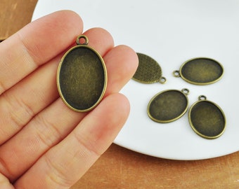 10-50 pièces de suspension ovale en alliage de bronze antique, ébauches de plateau de suspension, monture cabochon de lunette, 18 mm x 25 mm