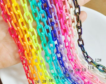 May include: Assortment of 12 colorful plastic chains, numbered 1 through 12. The chains are in various shades of red, orange, yellow, green, blue, purple, and pink.