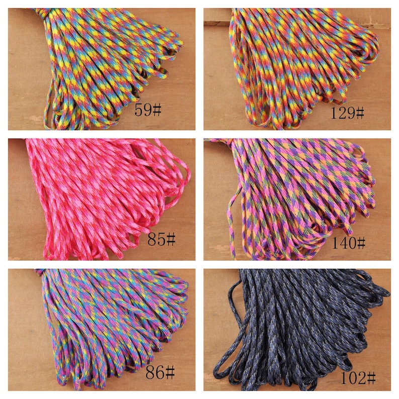 May include: Assortment of colorful paracord bundles. The image shows six different bundles of paracord in various colors, including rainbow, pink, purple, and gray. Each bundle has a number label, such as "59#" and "129#".