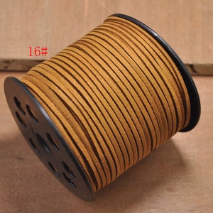 May include: A spool of brown leather cord, labelled "16#", wound around a black plastic spool with holes.