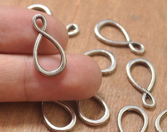 30 Stück Infinity-Link-Verbinder-Anhänger-Charms, Aufhänger-Charms, 8 Verbinder antik silberfarben 2-seitig - 21 x 11 mm.