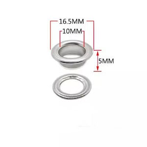Może przedstawiać: Srebrne metalowe oczka o średnicy wewnętrznej 10 mm i średnicy zewnętrznej 16,5 mm. Oczka mają grubość 5 mm.