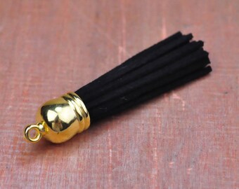 56mm (2.2 ")Nappa lunga in pelle nera nappa in fibra di fiocco con nappa di frangia con ciondolo in plastica dorata larga 12 mm