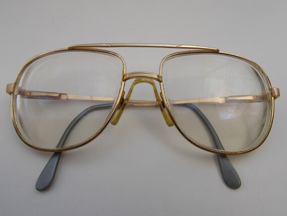 lacoste gold frame glasses