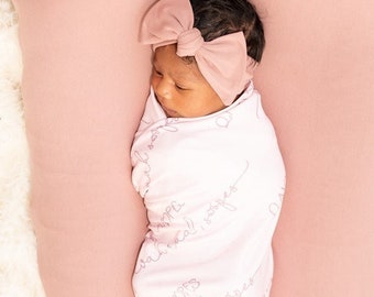 light pink swaddle blanket