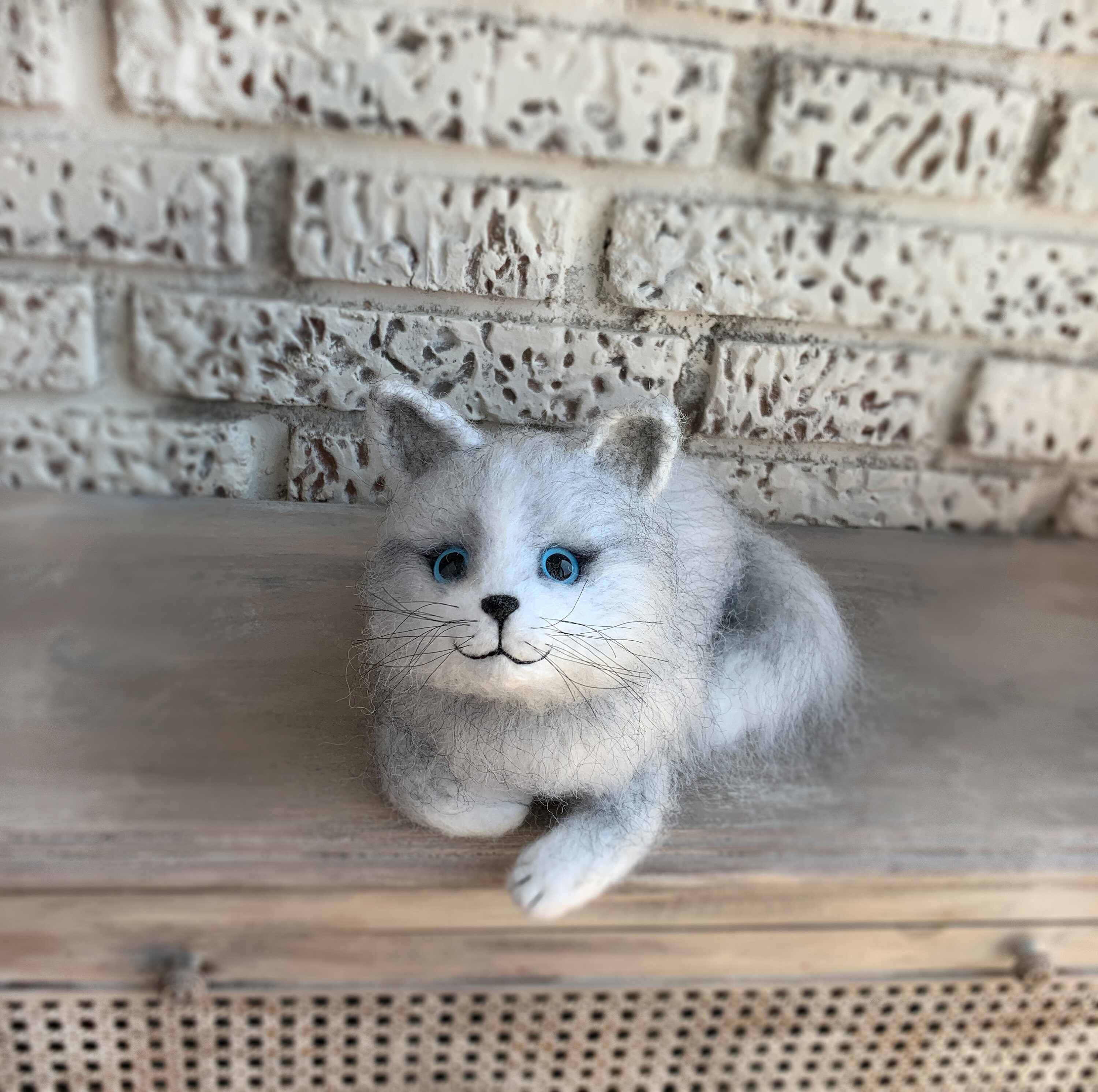 gray and white stuffed cat