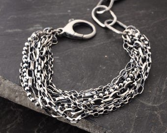 Pulsera de plata de ley oxidada con múltiples cadenas – Diseño moderno en capas