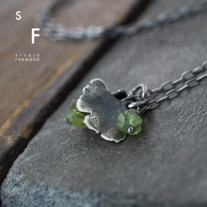 greenFORM - oxidized sterling silver ginkgo biloba leaf and peridot   -  dainty necklace
