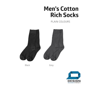 May include: Two pairs of cotton socks, one black and one grey. The socks are shown on a white background. The text "Men's Cotton Rich Socks" and "PLAIN COLOURS" is above the socks.