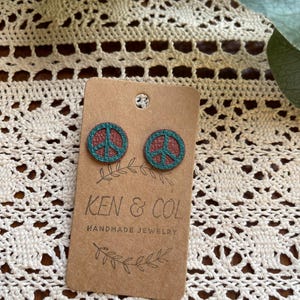 Pendientes de cuero sintético con forma de símbolo de la paz
